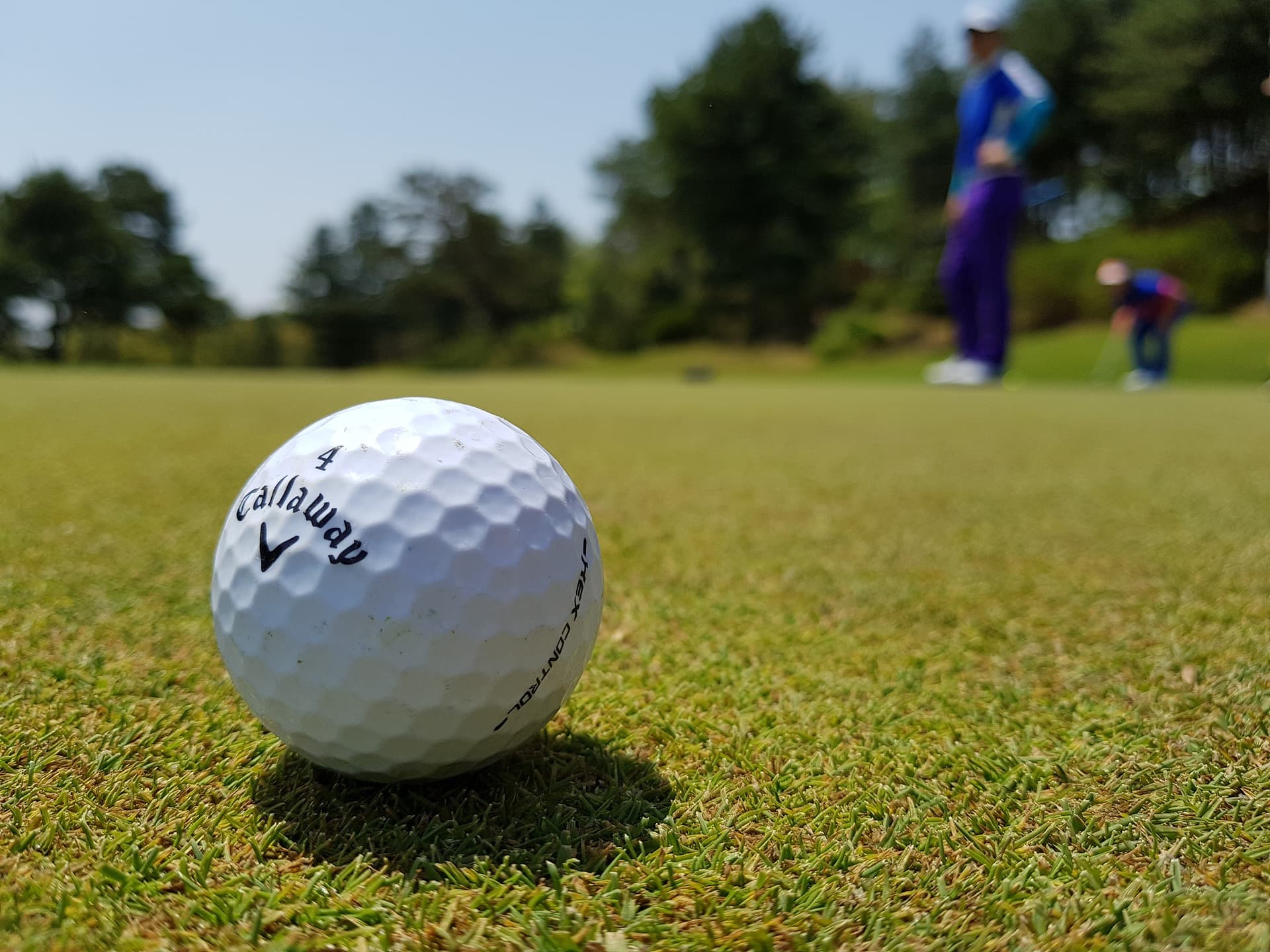 A man playing golf.